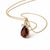 Garnet and CZ Teardrop Pendant This elegant pendant features a captivating pear-shaped garnet gemstone, celebrated for its...
