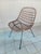 Vintage chair dating back to the 1960s. Structure in painted iron rod and woven rattan. Designer Gian Franco Legler This...