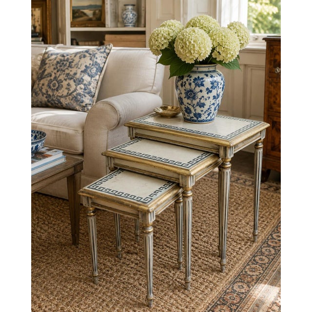 A wonderfully versatile set of three Italian nesting tables that effortlessly bridges Palm Beach glamour, English country...