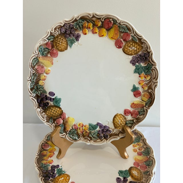 Chairish Description: A set of 6 dinner-sized plates by Lefton, with a dimensional majolica-style border of pineapples,...