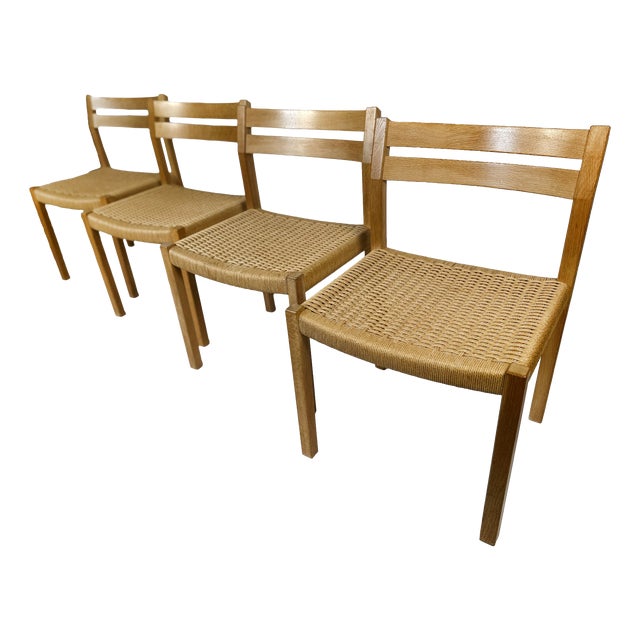 Danish Model 401 Dining Chairs in Oak with Papercord Seats by J.H. Møller for J.L. Møllers, Denmark, 1970s, Set of 4 For Sale