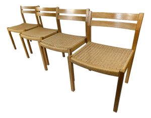 Danish Model 401 Dining Chairs in Oak with Papercord Seats by J.H. Møller for J.L. Møllers, Denmark, 1970s, Set of 4