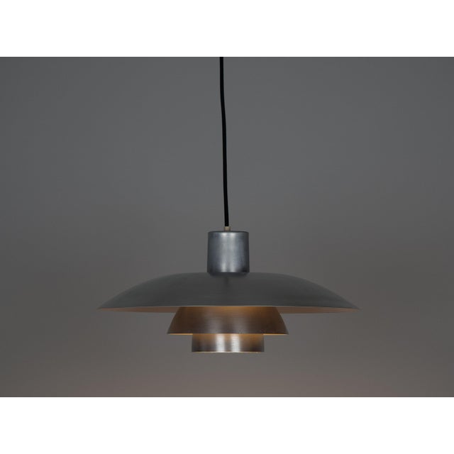 The ph 4/3 lamp is an absolute classic, designed by the renowned danish designer and architect poul henningsen. It has...