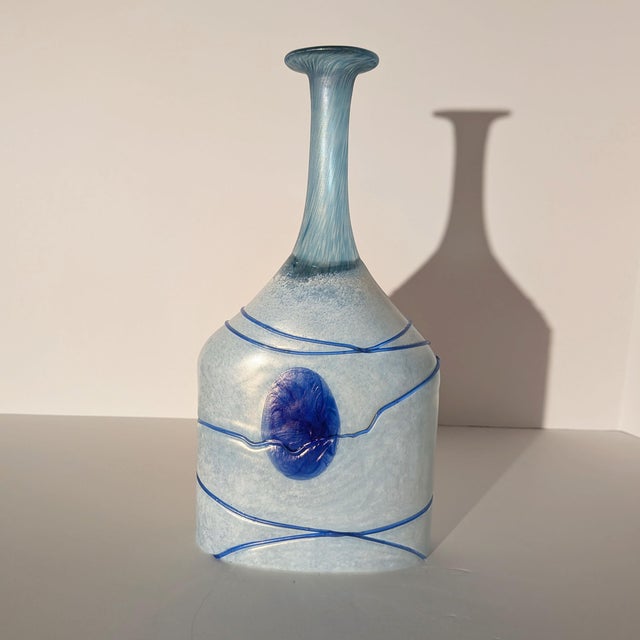 This is an exceptional, pristine example of modern Scandinavian studio art glass: The "Galaxy Blue" Large Bottle Vase,...