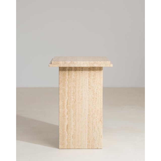 Emanating the refined sensibility of Italian design at its most assured, this circa 1970 travertine pedestal exemplifies...