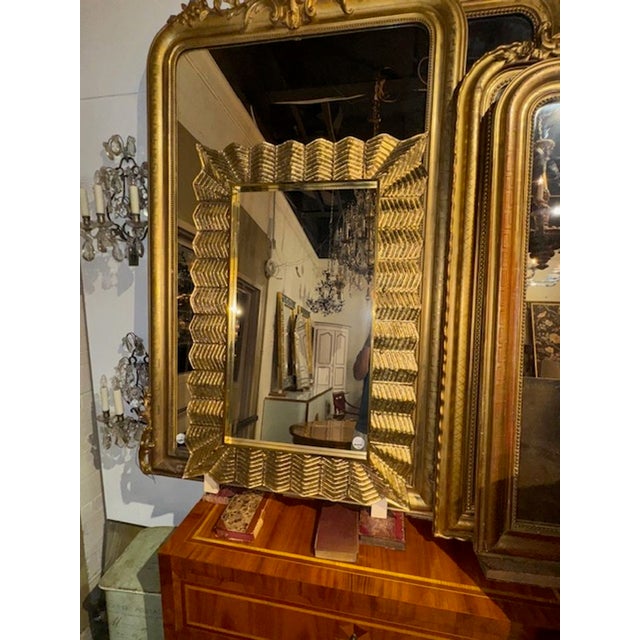 Add elegance to your space with these stunning Murano glass mirrors. The mirrors features a beautiful zigzag pattern and...