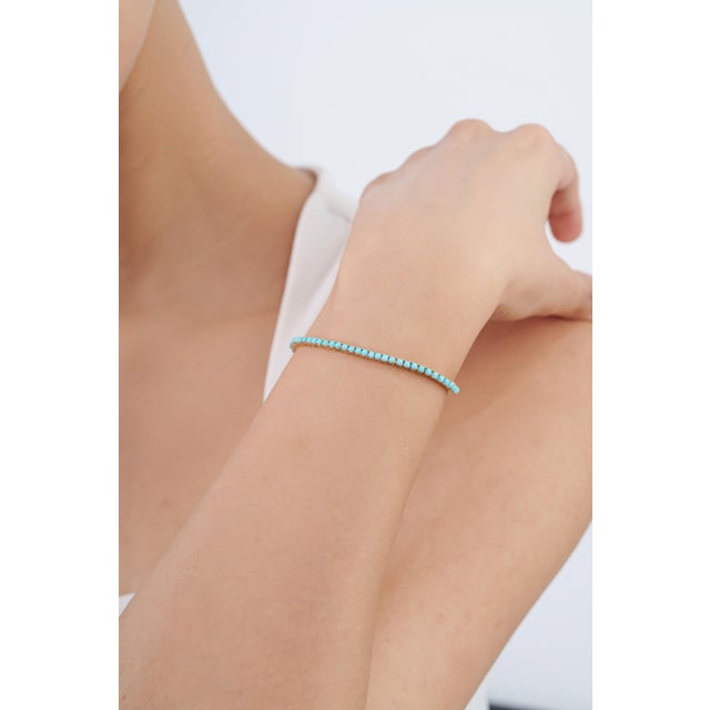 Add a refined pop of color to your everyday style with this elegant 14K Solid Gold Natural Turquoise Bracelet, featuring...