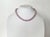 Indulge in the timeless beauty of this exquisite pink Edison pearl necklace. Measuring 18 inches in length and featuring...