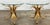 Dress to impress with these statement Italian mid century Hollywood Regency gilt metal sheaf of wheat side tables in the...