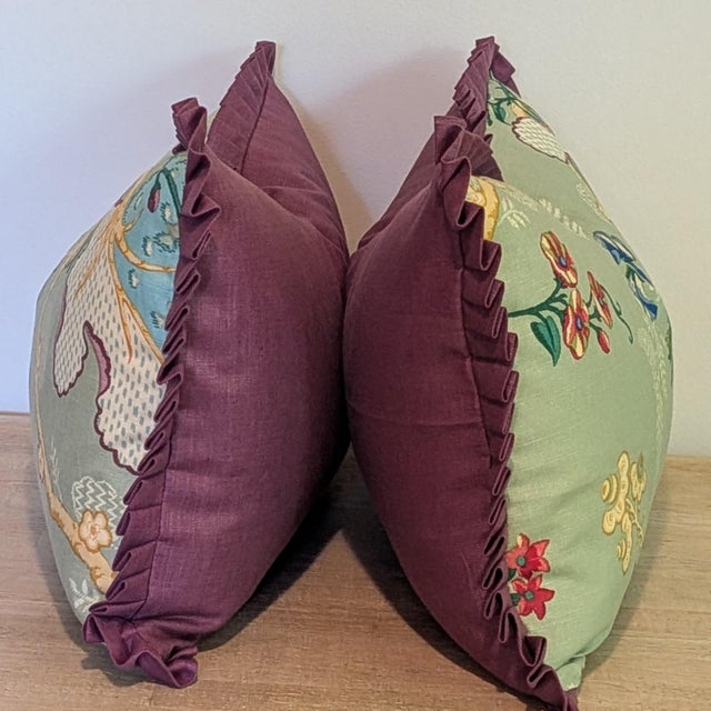 Brunschwig & Fils Fabriano Jade Lumbars feature a pretty botanical print, with Schumachers glazed linen in Concord...