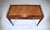 An exceptional writing desk In the French style featuring two drawers, embossed tooled leather writing surface, three-...