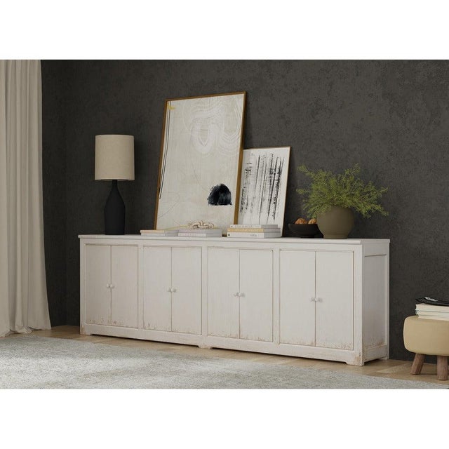 Eight doors span a 122-inch case designed for substantial storage along a broad wall. Eight tall narrow flat-panel doors...