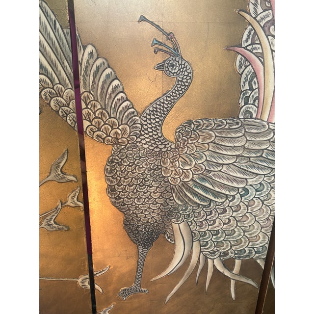 This is a Maitland Smith screen that has gold and peacocks in brown and beige tones, which works really well. This screen...