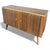 This mid century sideboard by Morris of Glasgow is a refined storage unit that combines elegant walnut veneer...