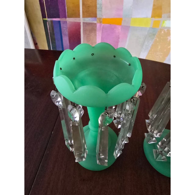 A rare crystal opaline pair of lustres in jade green color attributed to Baccarat. French Baccarat manufacturing ( the...