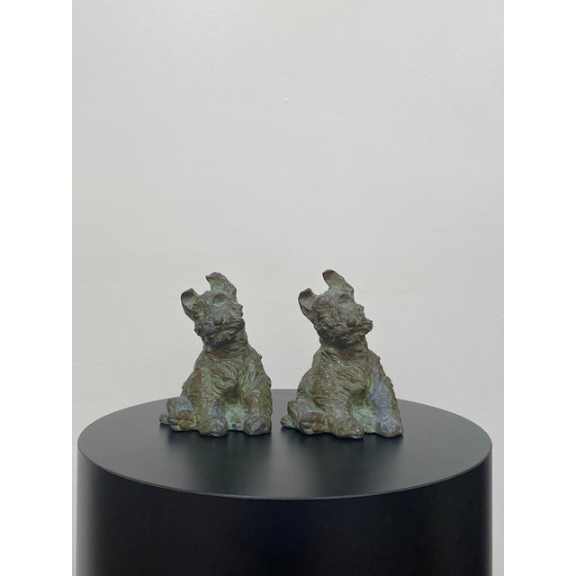 Elegant and substantial, this pair of heavy cast bronze Scottish Terrier bookends was designed by noted American sculptor...
