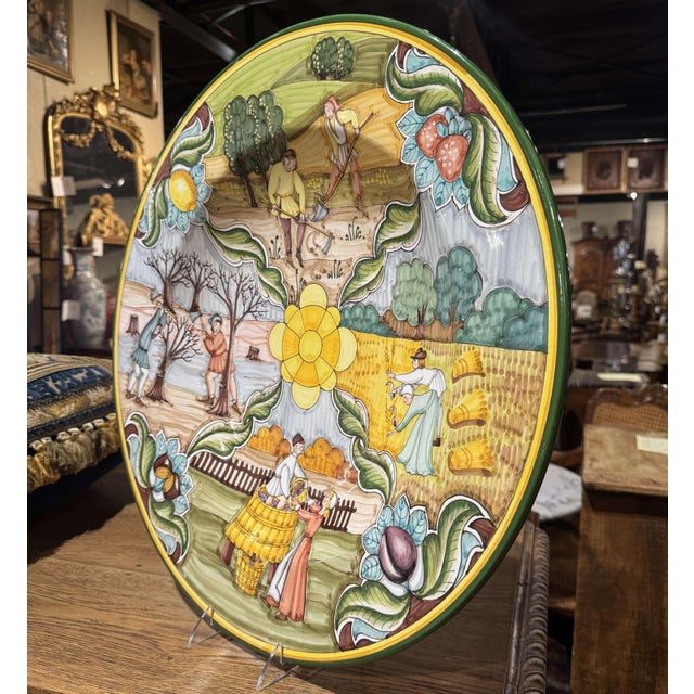 This impressive Italian charger captures the rhythm of rural life through a colorful series of hand-painted seasonal...