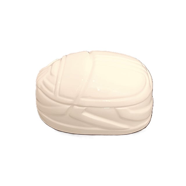 A Tiffany and Co. white scarab trinket box to add to your collection. This trinket box was made in 1977 but, was issued as...