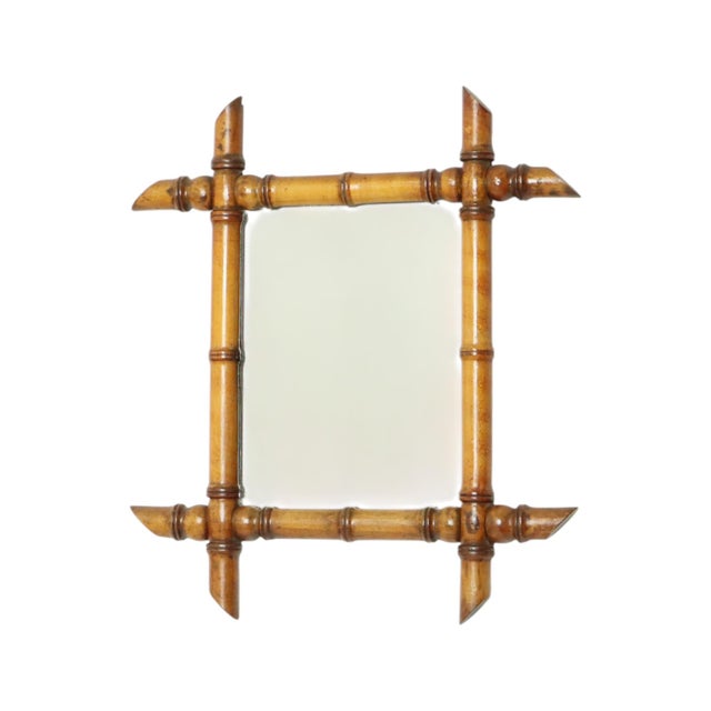 Antique faux bamboo mirror with original mirror plate and planked back, entirely in Chinoiserie style; this style was very...