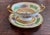 Rare, complete service for 12 of antique French porcelain cream soup bowls and matching underplates (24 pieces total)....