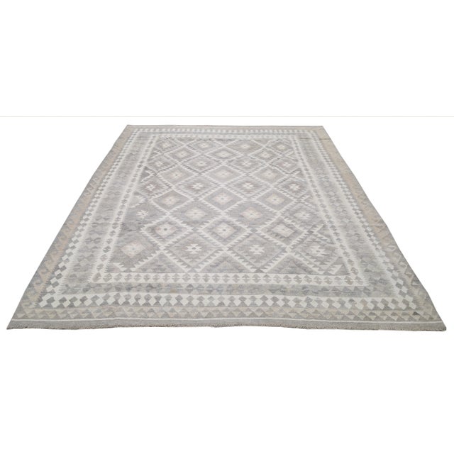 Afghan tribal hand woven flatweave/kilim with soft texture, organic colors and fine weave.