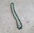 Graduated Malachite beaded 21". Purchased in the 70's from the Zaire (now the Congo). It is hand strung uniquely without a...