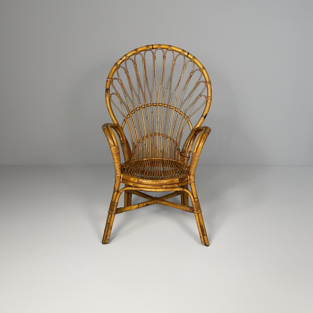Italian modern armchair by Gerbella Torino, 1970s Honey-colored bamboo armchair with a wide, rounded, fan-shaped backrest....