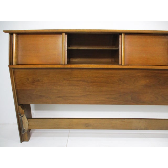 A rare special order Mid Century walnut headboard since King mattresses were not very common during that time. Having...