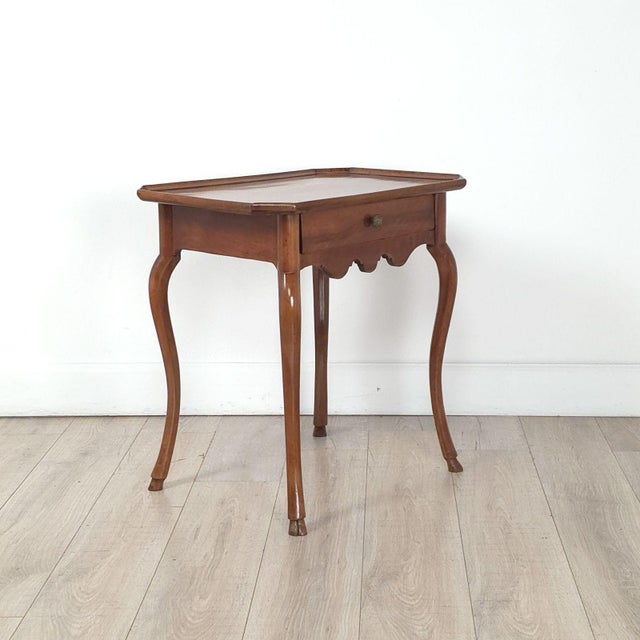 An 18th-century fruitwood tray top table, Italy.