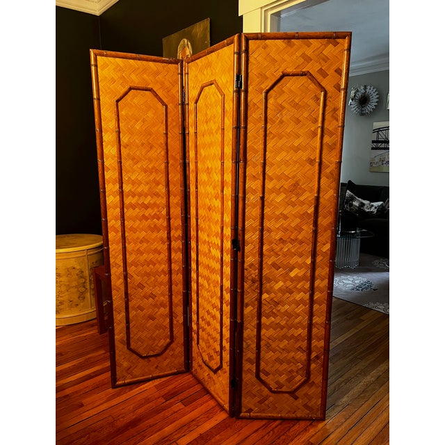 Striking bamboo and rattan folding screen with herringbone pattern. Makes a great statement piece in almost any room!