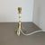 Article: Table light Origin: Germany Producer: Vereinigte Werkstätten München Age: 1950s. This original vintage Minimalist...