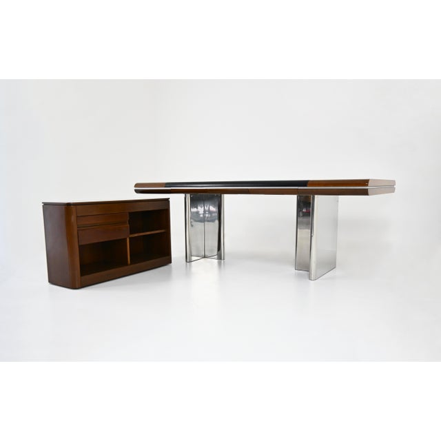Leather, metal, and wood desk with 3 drawers and a sideboard on casters that can be moved anywhere. Designed by hans von...