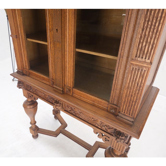 Jacobean Heavily Carved Oak Faces Urns Motive Two Door China Cabinet c1880s For Sale - Image 3 of 12