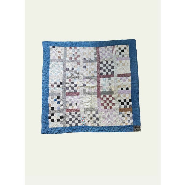 Beautiful antique hand-quilted scrap patchwork quilt dating from approximately the 1920s–1940s. This one-of-a-kind folk...