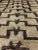 Textile Vintage Mid-Century Turkish Tulu Rug With Connected Tribal Pattern in Brown and Cream For Sale - Image 7 of 13