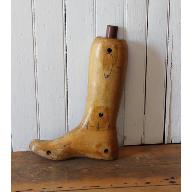 Beautifully crafted antique cobbler's boot form. Circa early-mid twentieth century. Solid and weighty, this is a beautiful...