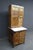 Rare salesman sample style Hoosier cabinet in oak featuring many of the functional details found in full-size examples,...
