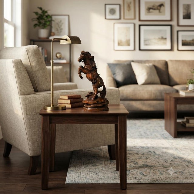 Exquisitely carved from rich, warm-toned wood, this dynamic 7-inch sculpture captures a spirited horse caught in mid-air...