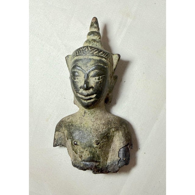Up for sale is a wonderful antique 17th century handmade bronze sculptural Buddha bust fragment from Thailand. It's made...