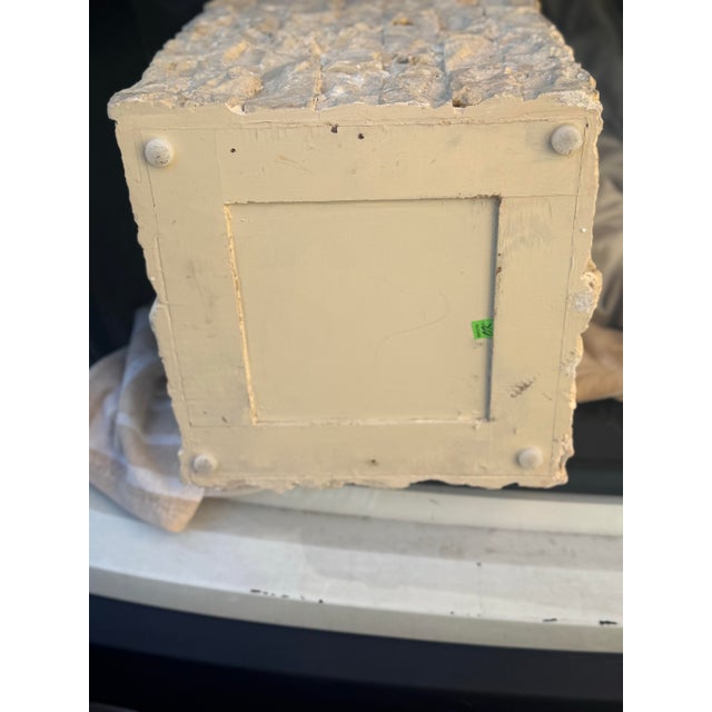 Beautiful and unusual architectural-style accent piece featuring a light cream/tan textured finish with a striking, rugged...