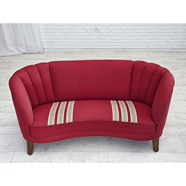 1960s, Danish 2-seater "Banana" sofa. Original red furniture wool, oak wood legs, brass springs in the seat. Original good...