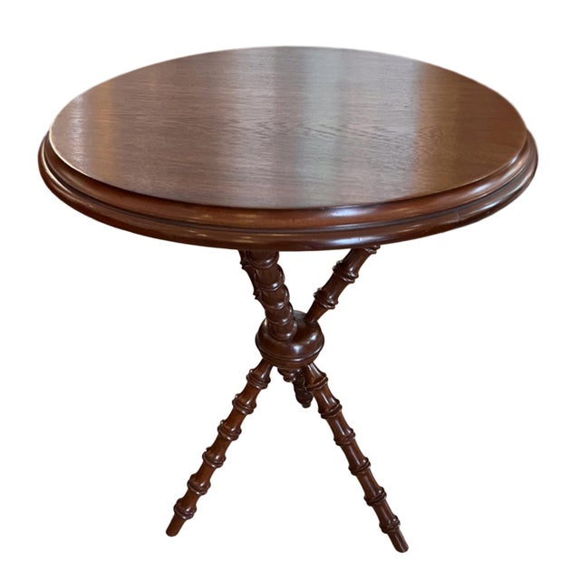 A quirky English 19th century mahogany 'bobbin' table. This mahogany table was made in England in the 19th century with a...