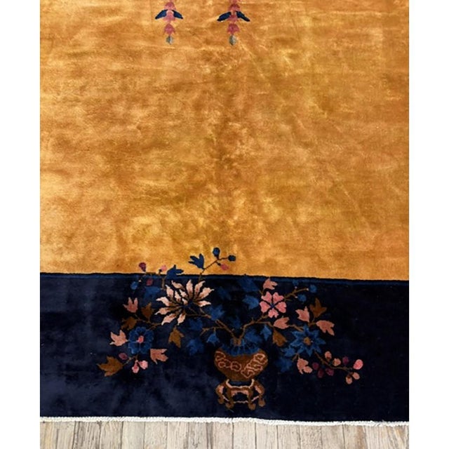 This monumental handknotted carpet is a stellar representation of the Chinese Art Deco weaving movement from the interwar...