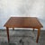 A beautifully proportioned 1960s teak extending dining table by Uniflex, combining a compact footprint with generous...