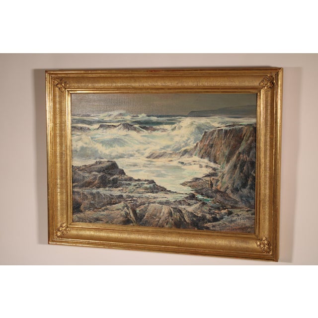 Impressionist rocky coastal seascape painting by Paul Lauritz (1889-1975). Probably Laguna Beach with Catalina Island in...