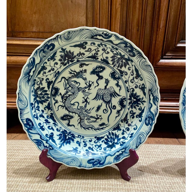 Chinoiserie Pair of Oversized Chinese Blue & White Porcelain Charger Plates With Dragon & Phoenix Motif – 17.4” For Sale - Image 3 of 12