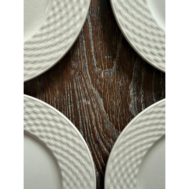 A beautiful set of six vintage Pagnossin Ironstone plates made in Treviso, Italy, featuring a classic creamy white glaze...
