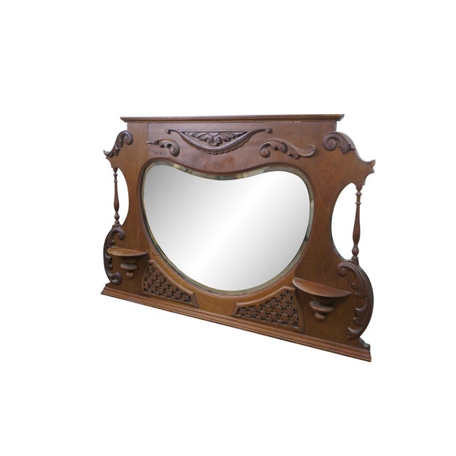 Antique Victorian walnut overmantel / dresser / vanity mirror featuring ornate fretwork and acanthus carvings and small...