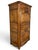 This exceptional late 18th to early 19th-century French Provincial "Homme Debout" (standing man) cabinet beautifully...