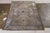A 4x6 antique Persian rug of Farahan design in blue and pink, hand-knotted in silk circa 1890-1900. Some distress in the...